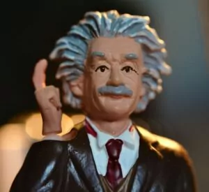 man in black suit jacket figurine